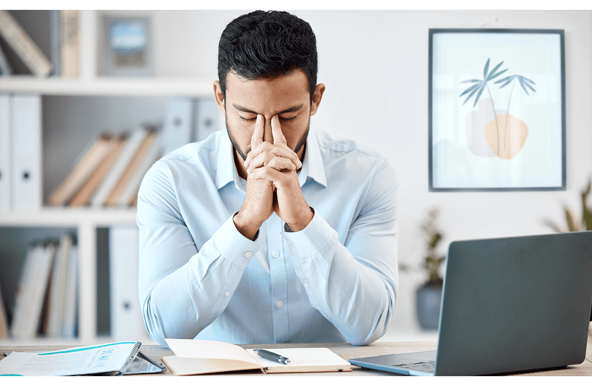 business man headache workplace stress