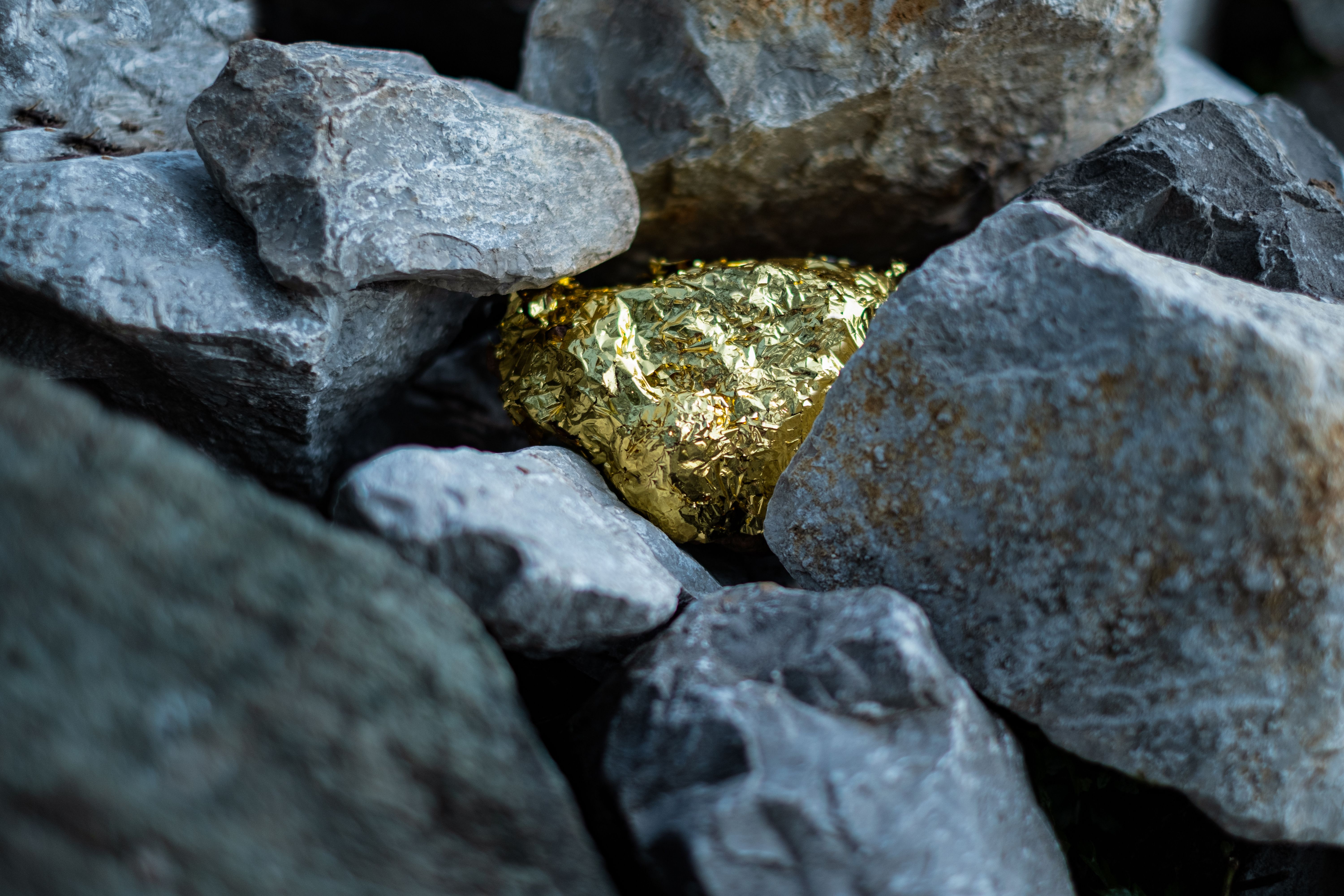 gold-nugget-and-grey-granite-stone-2023-11-27-04-59-24-utc.jpg