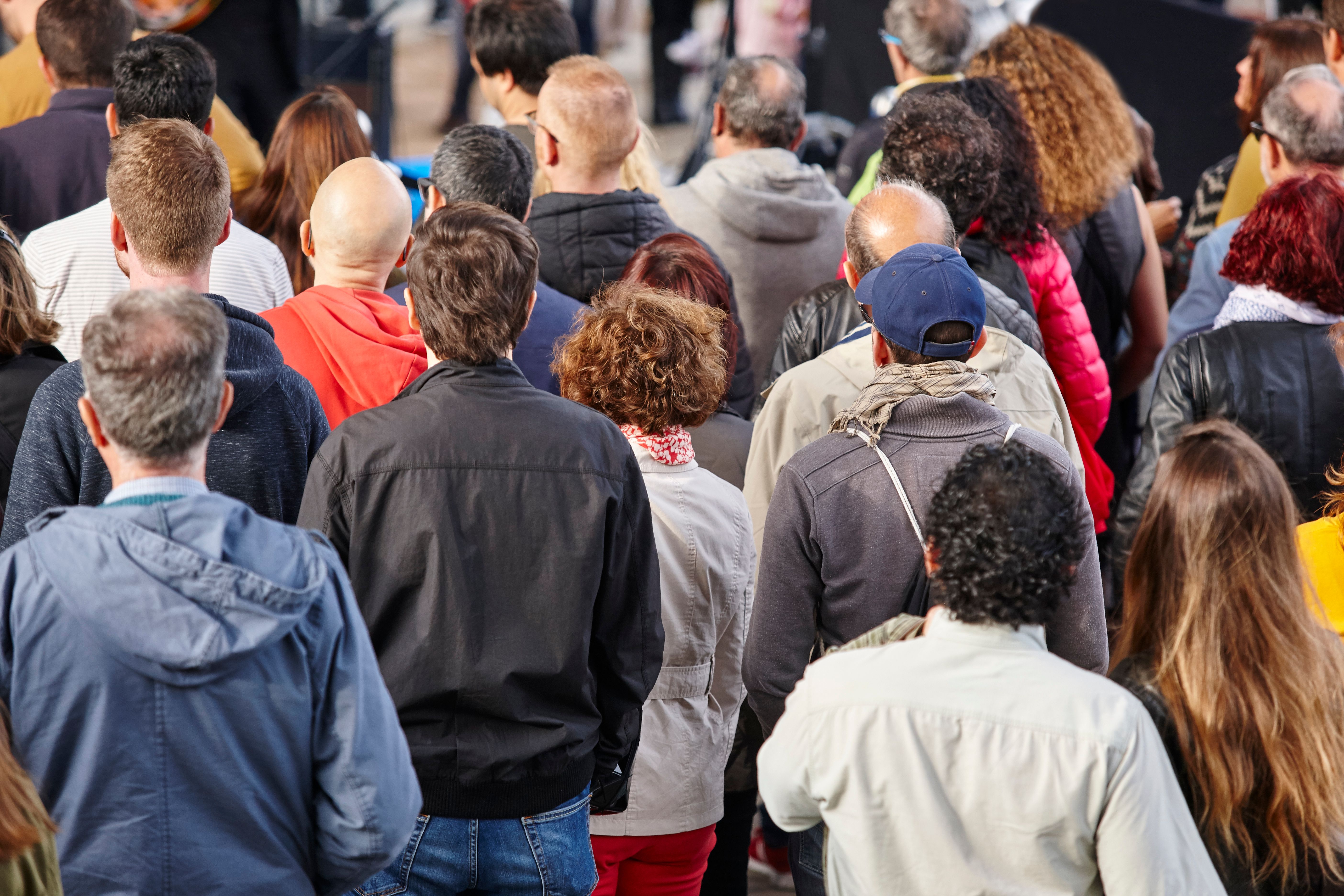 group-of-people-listening-on-the-street-urban-cro-2023-11-27-05-35-23-utc.jpg