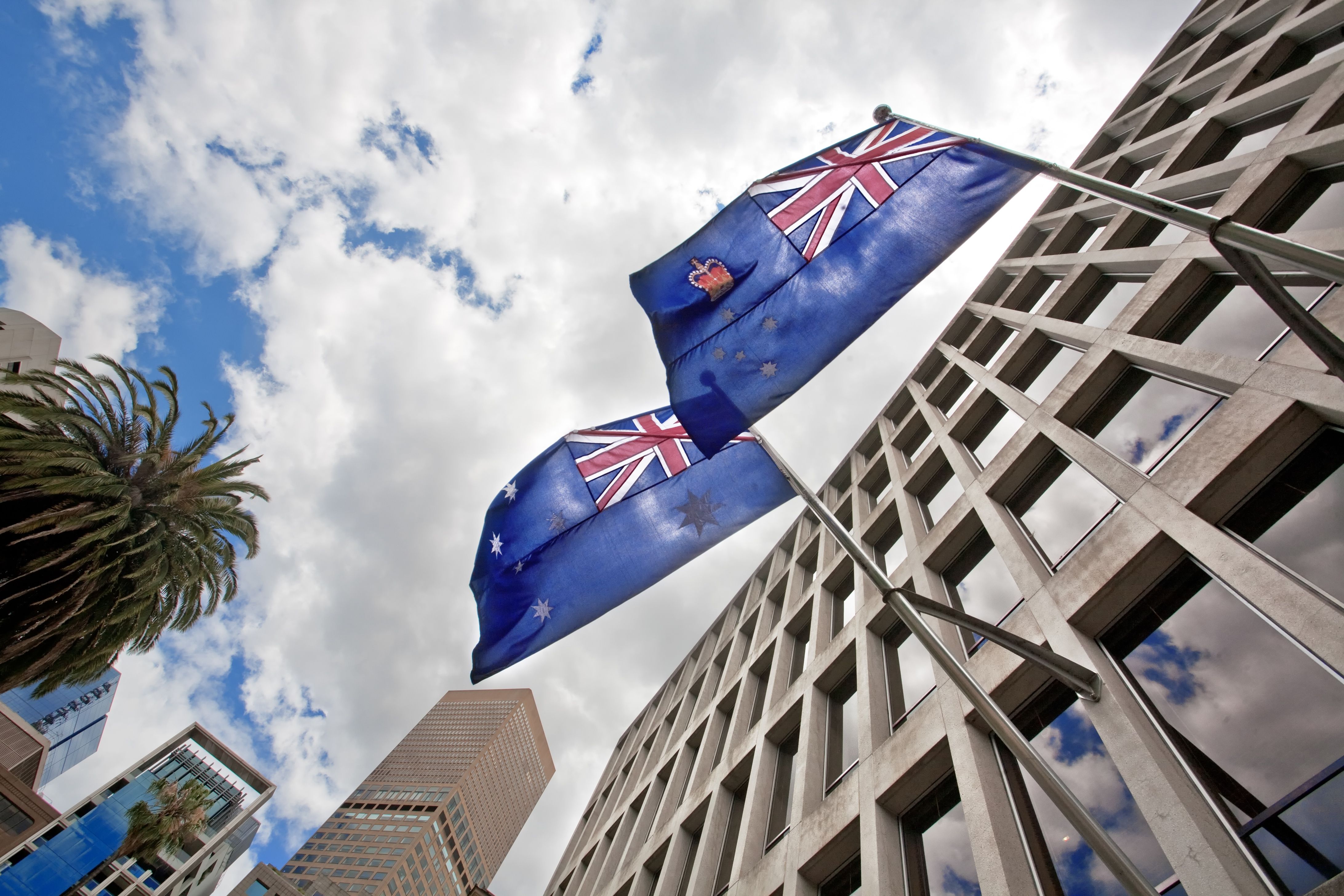 low-angle-shot-of-australian-flags-waving-from-a-g-2023-11-27-05-29-59-utc.jpeg