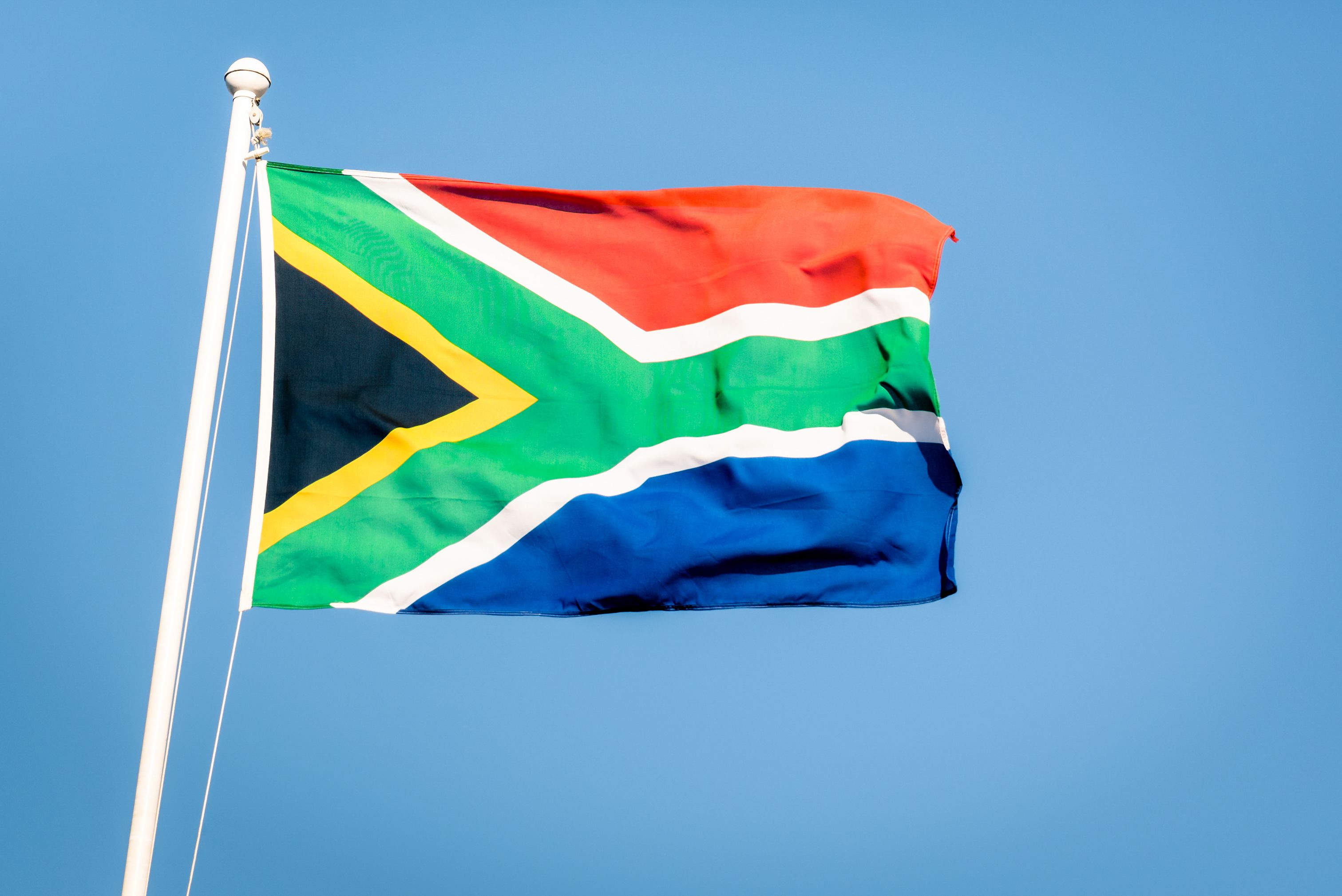 south-african-flag-on-a-blue-sky-2022-12-09-04-46-34-utc.jpg